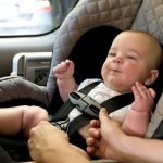 baby-in-a-back-seat-located-child-safety-seat